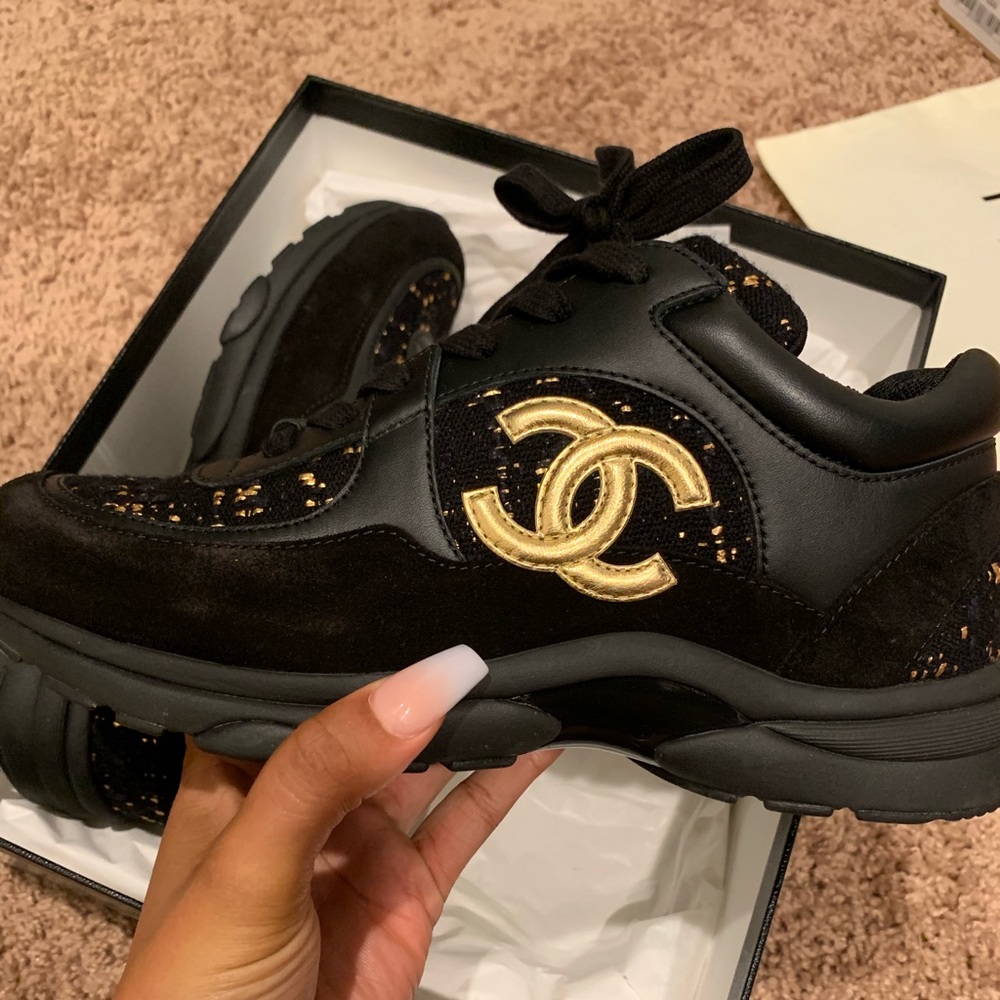 Chanel Black and Gold Sneakers.